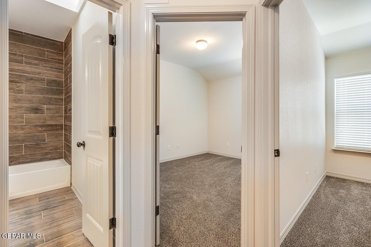 513 Caddo Lane Clint, TX 79836 - Photo 14 of 28 a view of a bathroom from a hallway