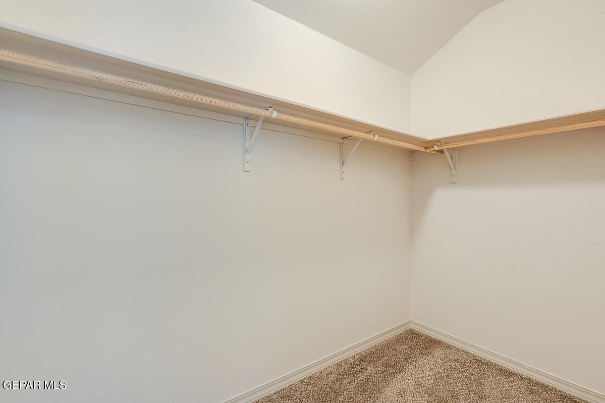 513 Caddo Lane Clint, TX 79836 - Photo 23 of 28 a view of a room with shelf on the wall