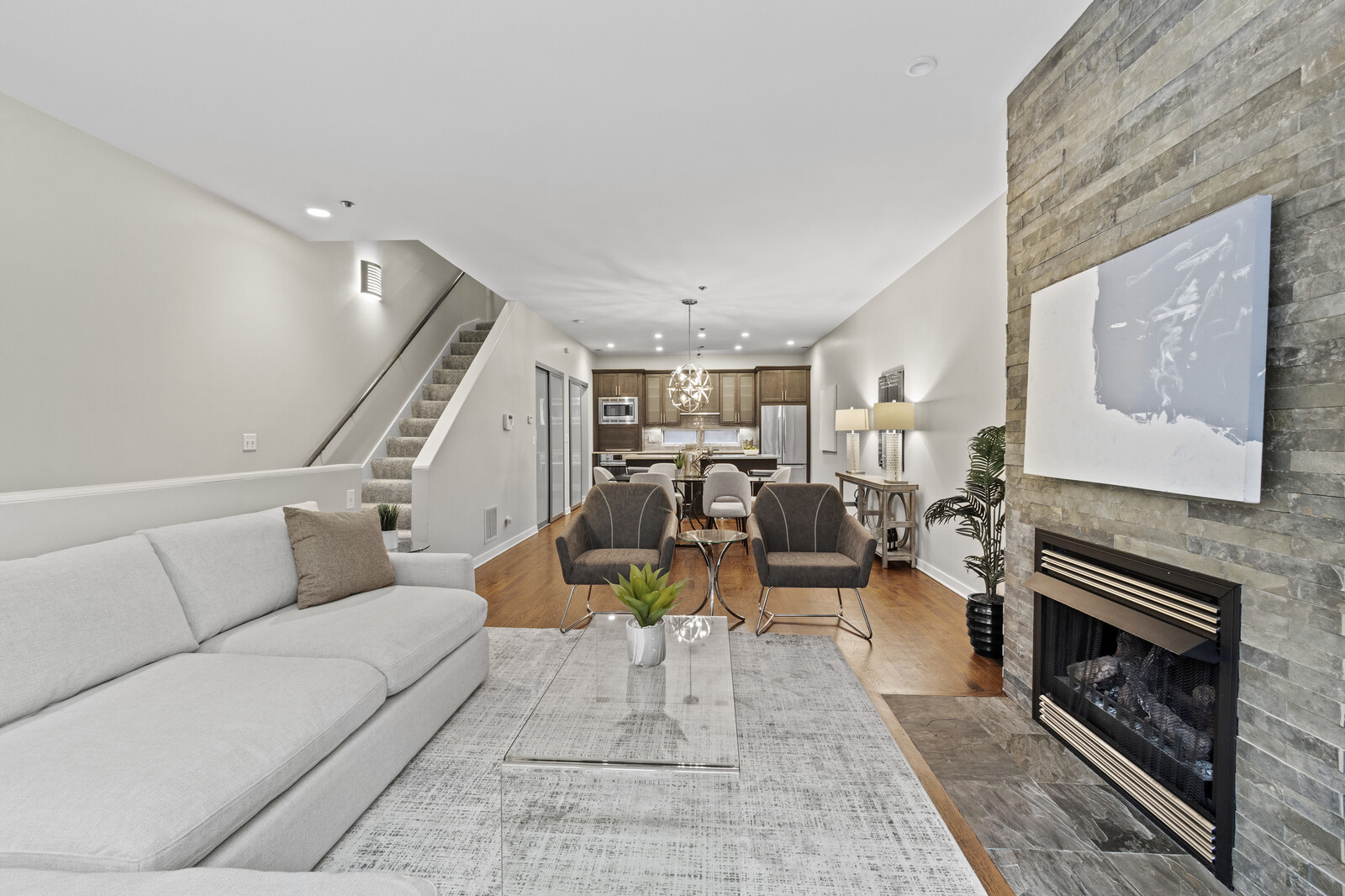 16 North May Street, Unit 511 Chicago, IL 60607 - Photo 3 of 26 a living room with furniture and a fireplace