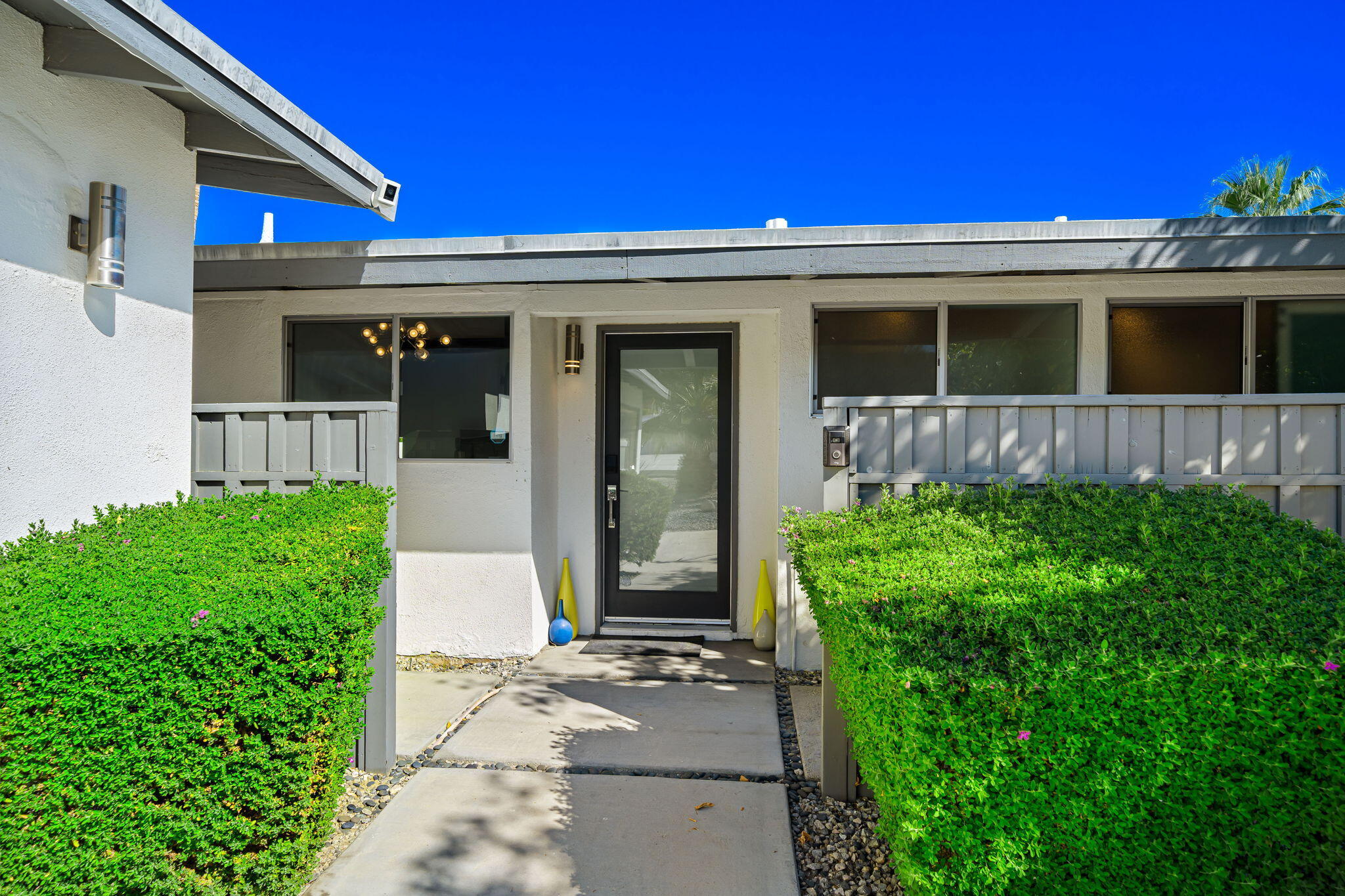 71718 Tunis Road Rancho Mirage, CA 92270 - Photo 8 of 43 a view of a house with a yard