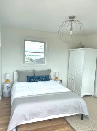 a view of a chandelier and window in a room