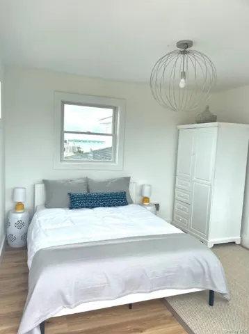 a view of a chandelier and window in a room