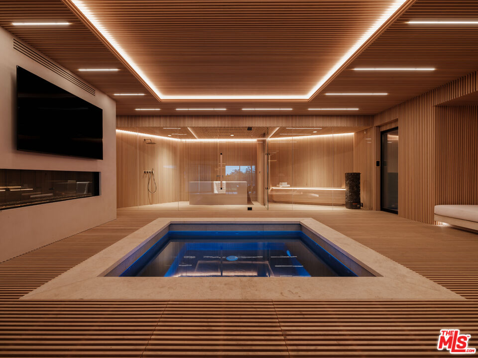 9126 Cordell Drive Los Angeles, CA 90069 - Photo 20 of 27 a view of swimming pool with seating area