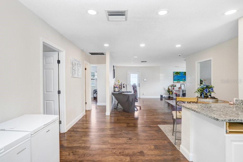 903 North Park Road Plant City, FL 33563 - Photo 19 of 28 a living room with furniture and a wooden floor