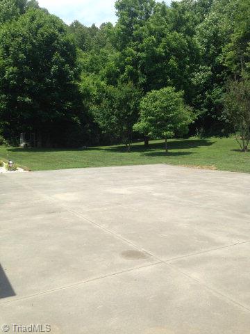 254 Gladys Fork Road Ferguson, NC 28624 - Photo 18 of 21 Nice backyard