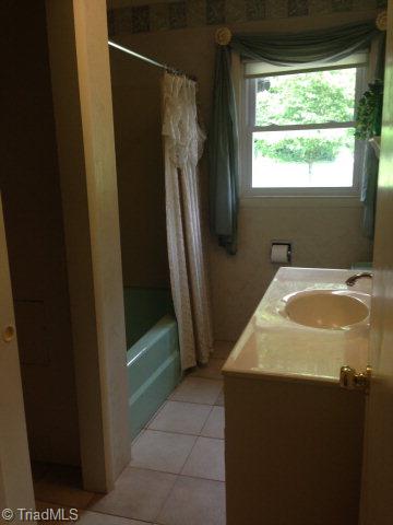 254 Gladys Fork Road Ferguson, NC 28624 - Photo 8 of 21 Nice sized bath