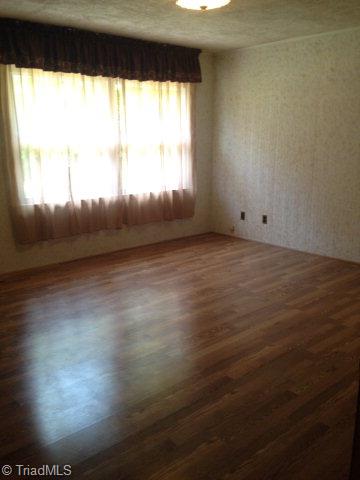 254 Gladys Fork Road Ferguson, NC 28624 - Photo 10 of 21 Master Bedroom