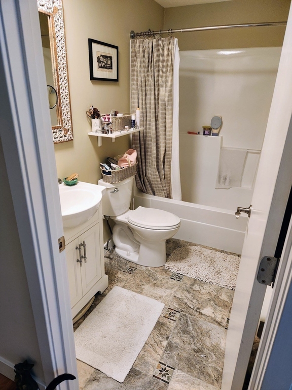11 Low Street, Unit 1 Newbury, MA 01951 - Photo 12 of 14 a bathroom with a sink toilet and shower