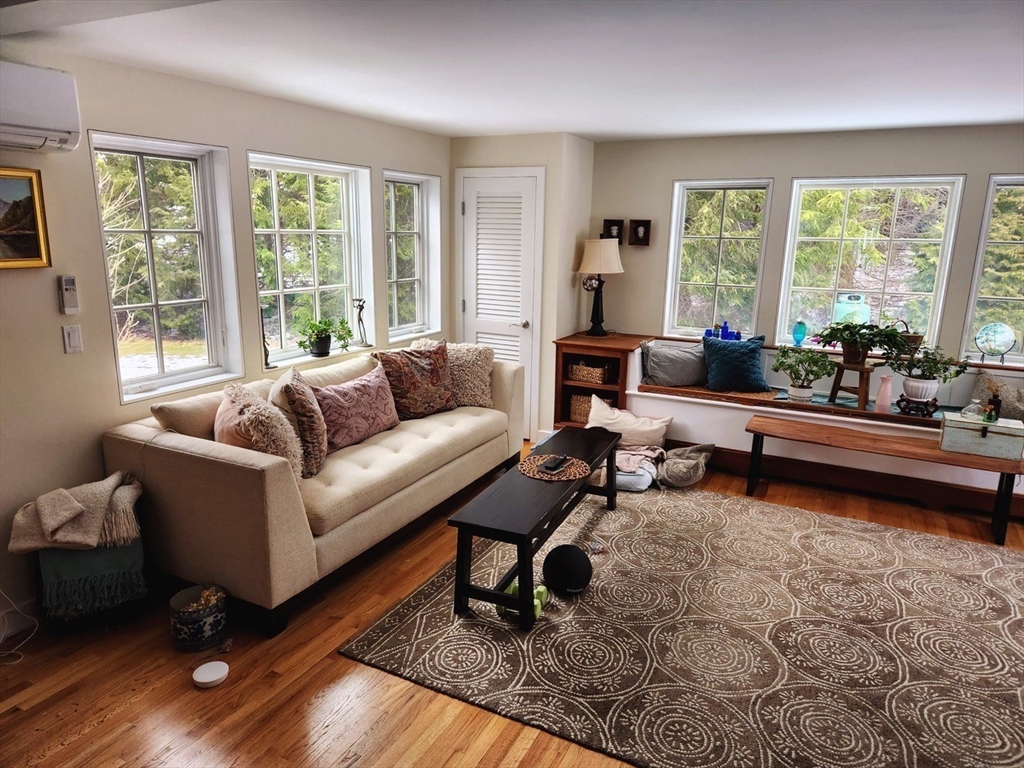 11 Low Street, Unit 1 Newbury, MA 01951 - Photo 6 of 14 a living room with furniture and a rug