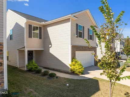 a picture of a bench in front of a wall