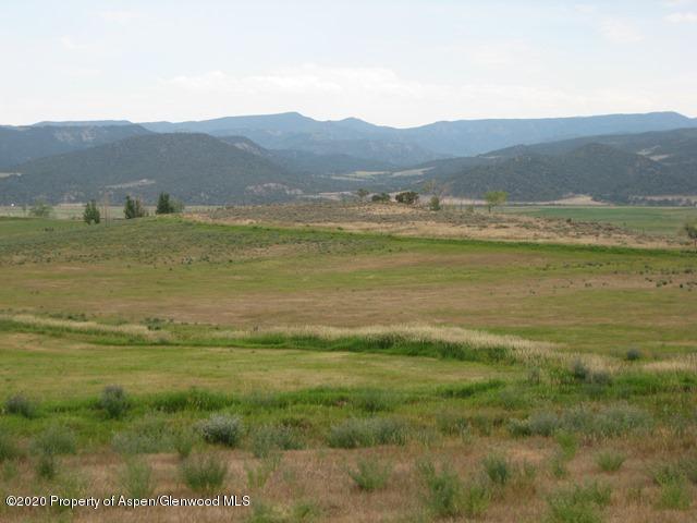 331 County Road 331 Silt, CO 81652 - Photo 1 of 15 a view of an ocean with mountains in the background