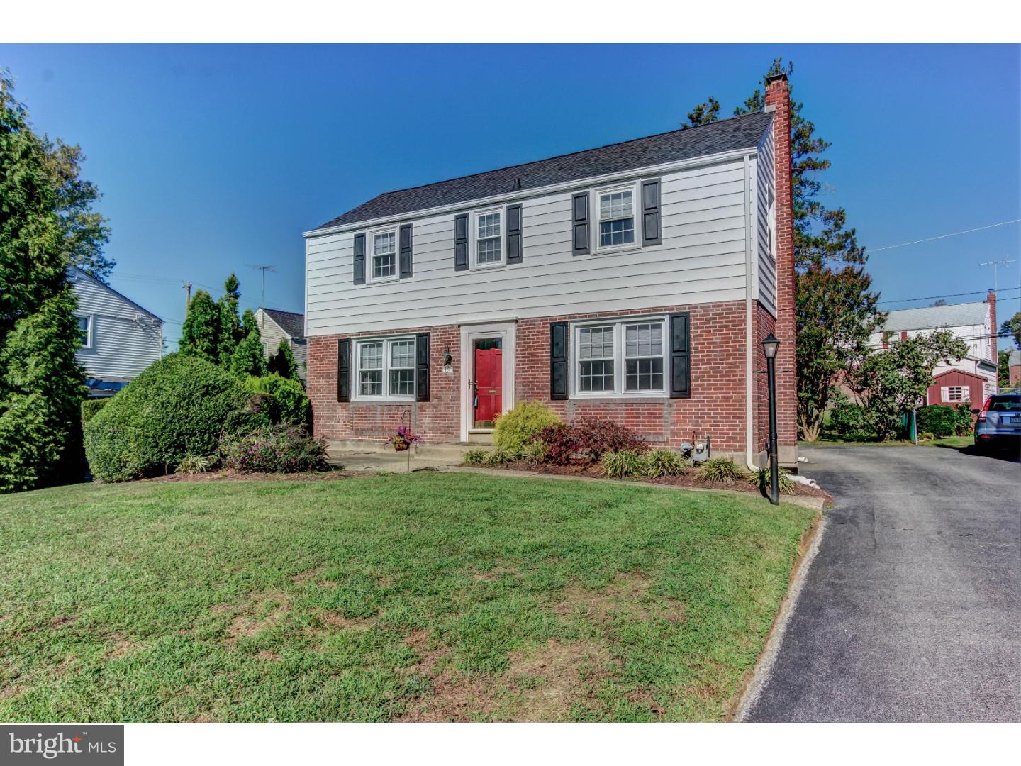 204 Pine Ridge Road Havertown, PA 19083 - Photo 11 of 24 a front view of a house with a yard