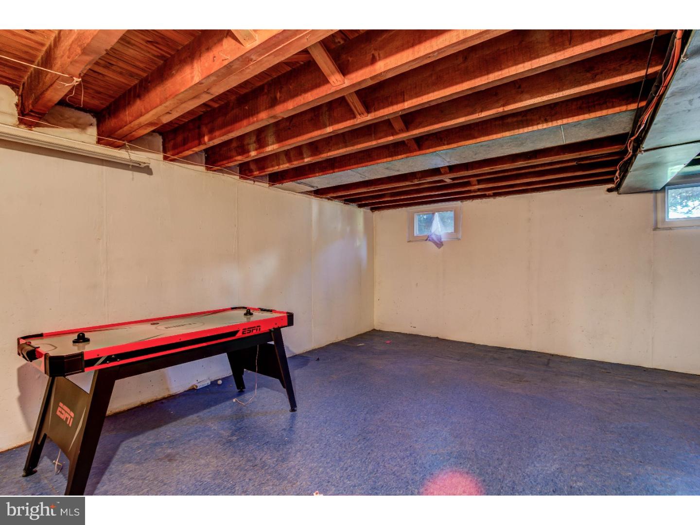 204 Pine Ridge Road Havertown, PA 19083 - Photo 12 of 24 a backyard of a house with wooden table and chairs
