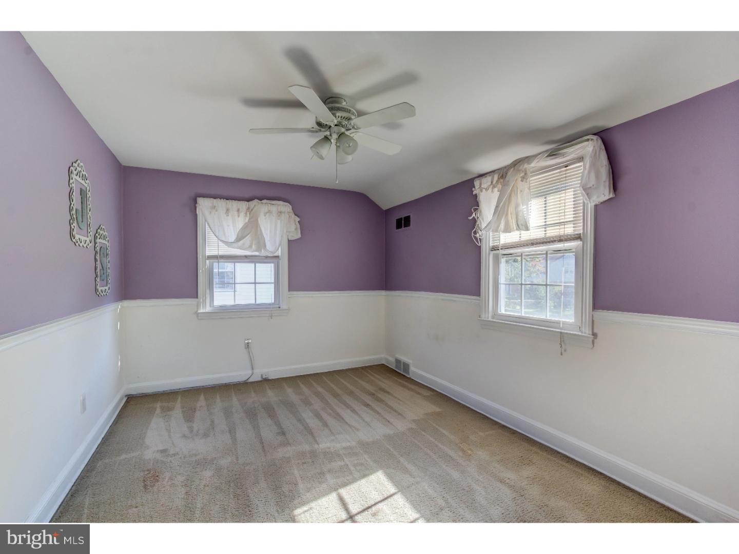 204 Pine Ridge Road Havertown, PA 19083 - Photo 16 of 24 a view of empty room with wooden floor and fan
