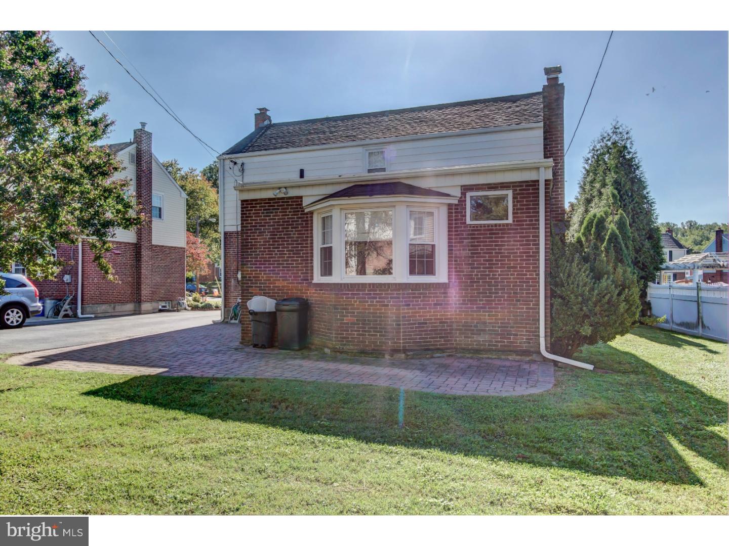 204 Pine Ridge Road Havertown, PA 19083 - Photo 20 of 24 a front view of a house with a yard