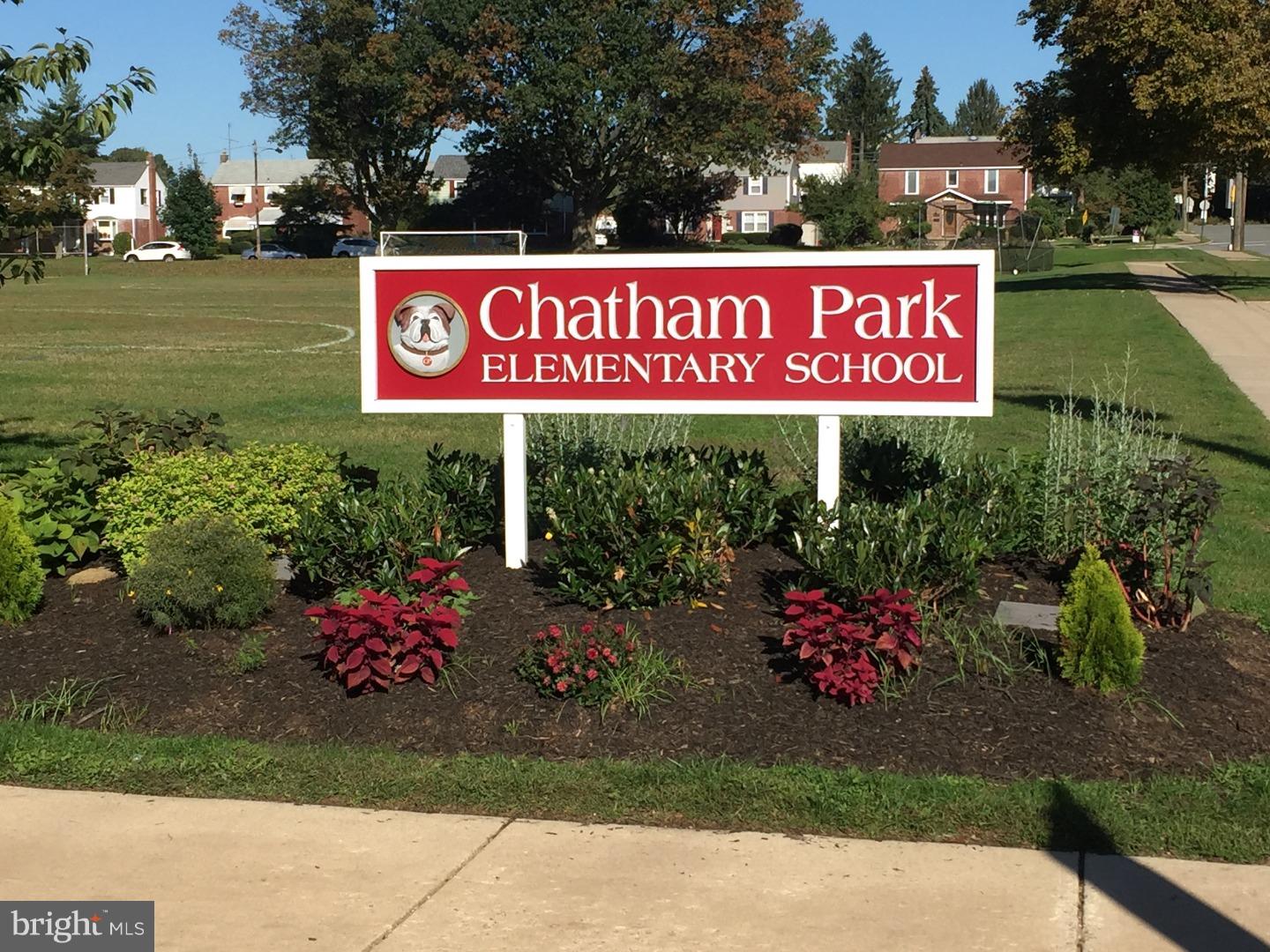204 Pine Ridge Road Havertown, PA 19083 - Photo 23 of 24 a sign that is sitting in front of flowers