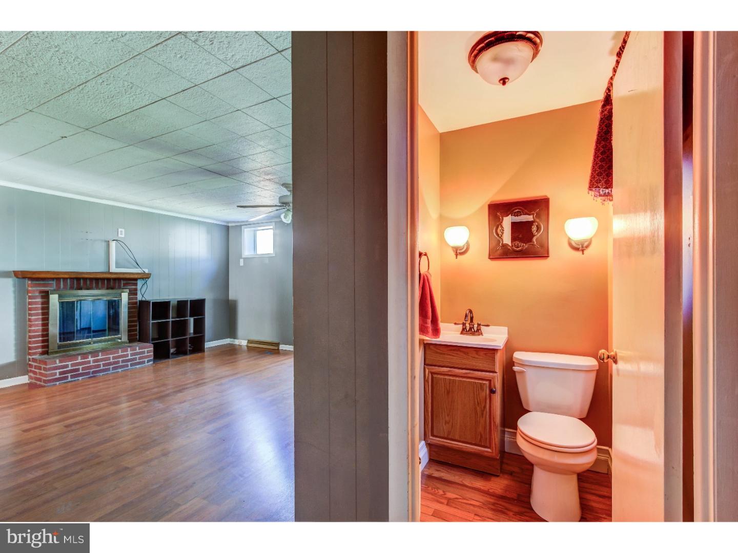 204 Pine Ridge Road Havertown, PA 19083 - Photo 8 of 24 a bathroom with a toilet and a mirror