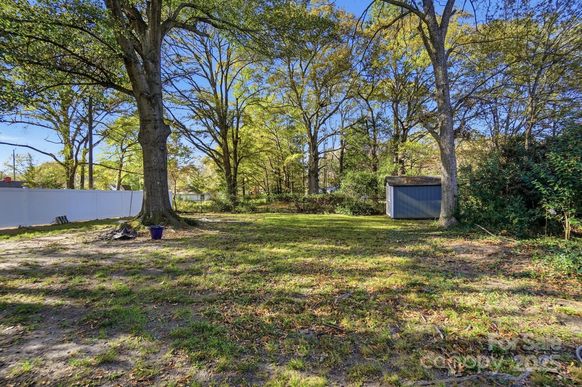 1607 Florida Street Gastonia, NC 28052 - Photo 23 of 24 a backyard of a house with lots of green space