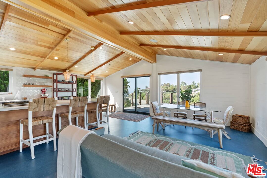 249 Paradise Cove Road Malibu, CA 90265 - Photo 8 of 41 a living room with furniture and a large window