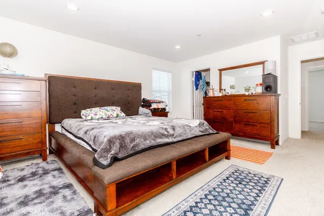 a white toilet sitting in a bathroom