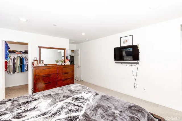 a room with mirror and window