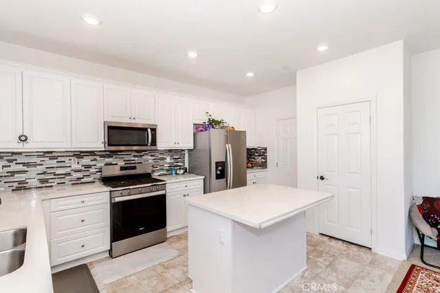 an aerial view of residential houses and outdoor space