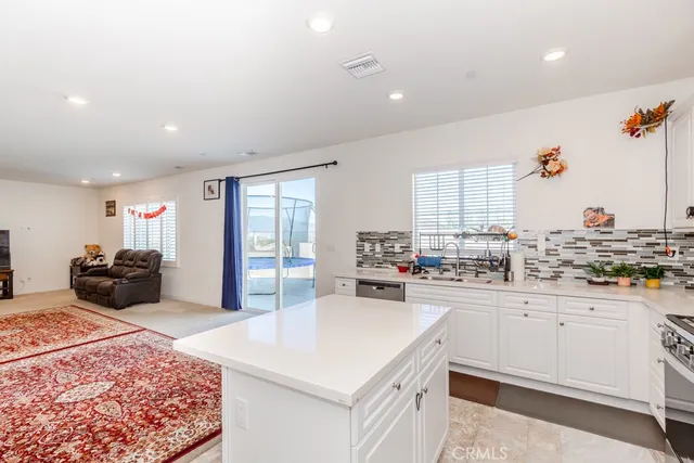 an aerial view of residential houses and outdoor space