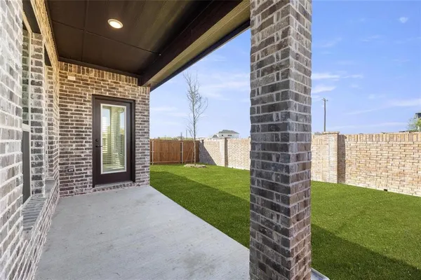 a view of a porch with a backyard