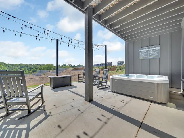 a view of a swimming pool with a terrace