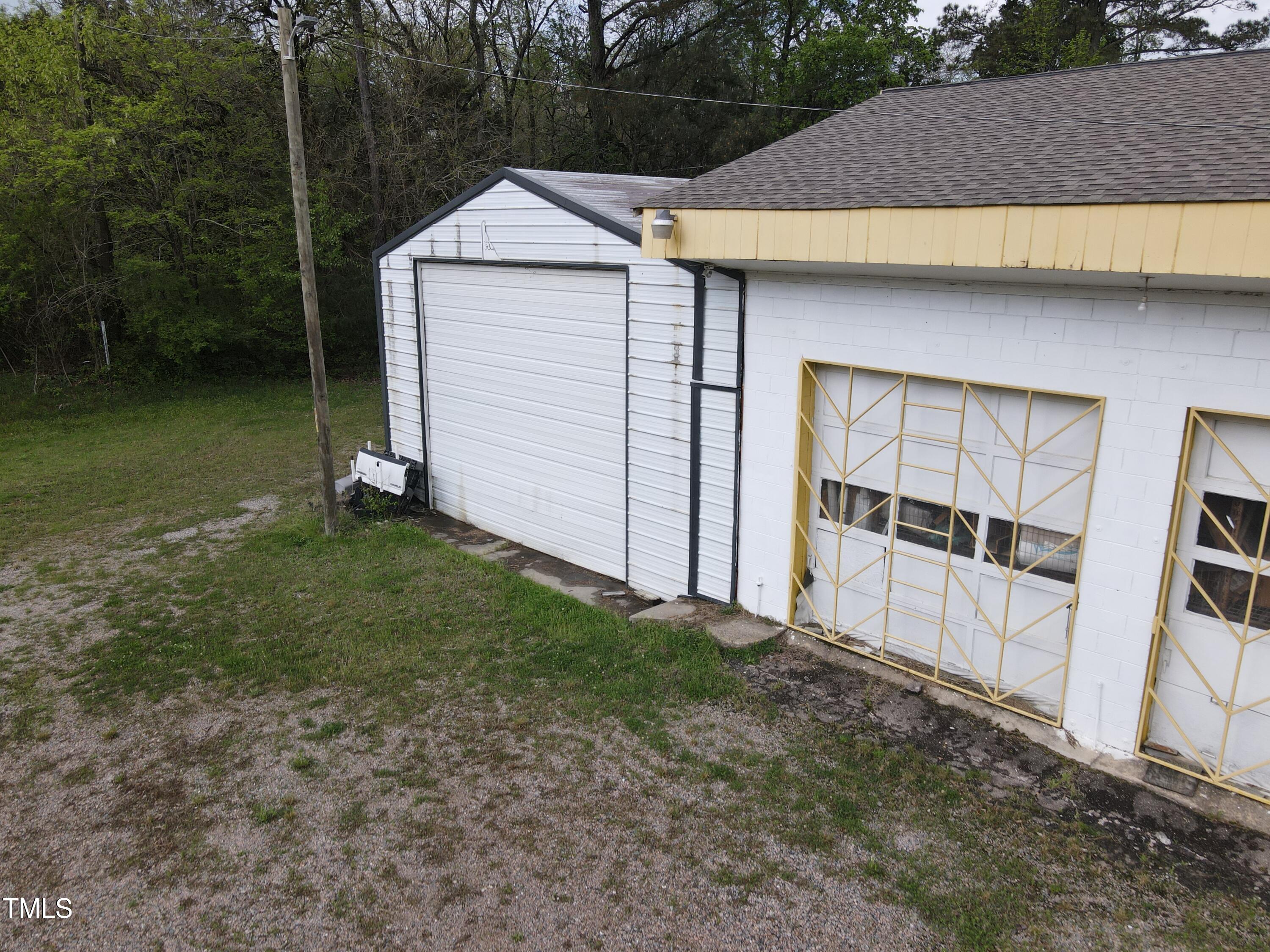 1594 Us Highway Kittrell, NC 27544 - Photo 20 of 24 a view of a backyard with a garden