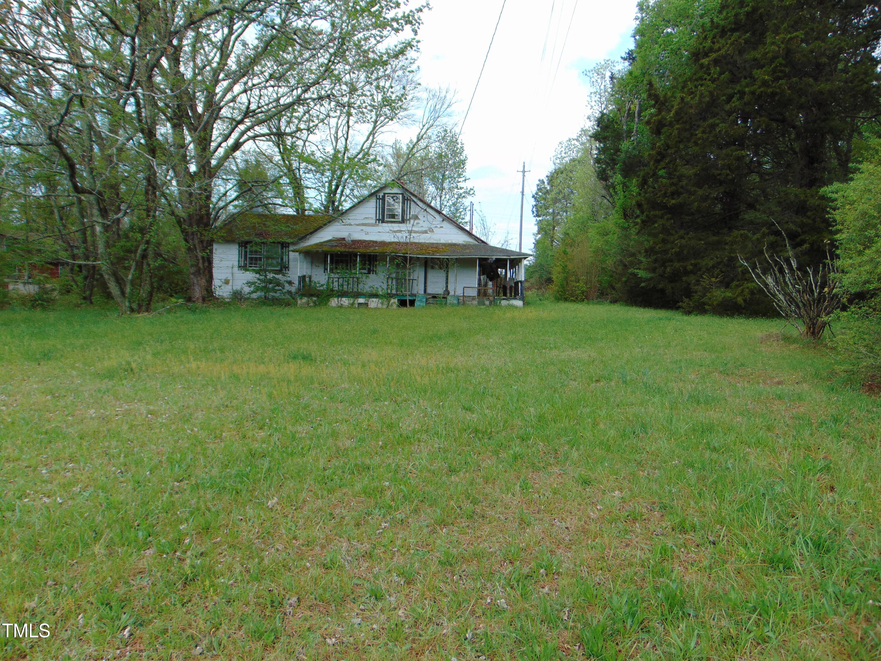 1594 Us Highway Kittrell, NC 27544 - Photo 5 of 24 a front view of a house with garden