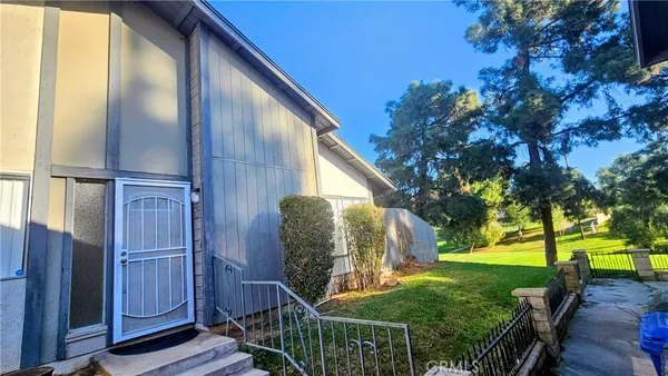 a view of a porch with a backyard