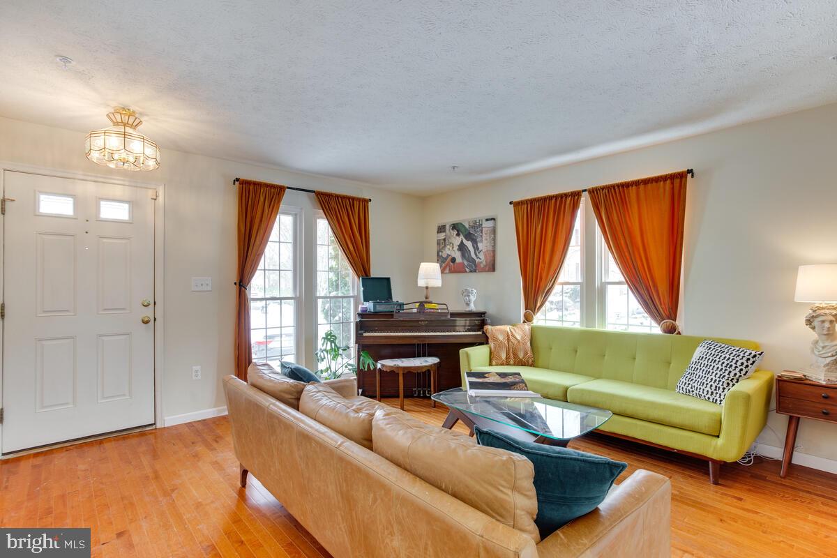1703 Bluffs Island Court Odenton, MD 21113 - Photo 5 of 38 a living room with furniture and a window