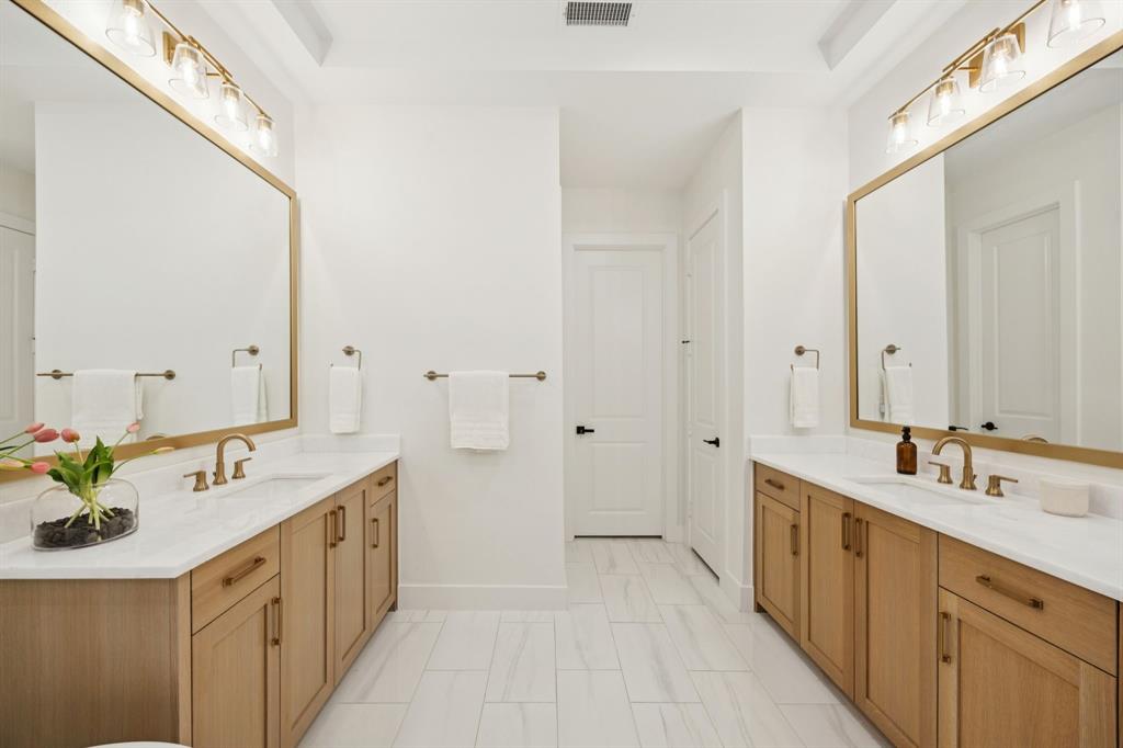 6281 Edgestone Drive Frisco, TX 75034 - Photo 20 of 40 His and hers vanities and her closet.