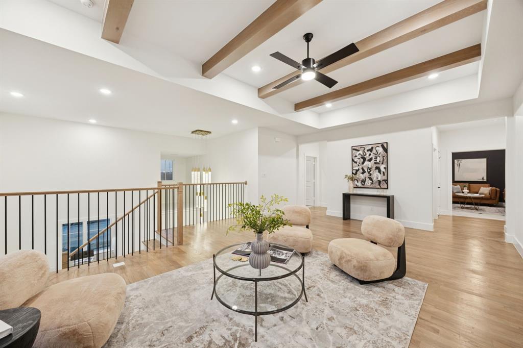 6281 Edgestone Drive Frisco, TX 75034 - Photo 27 of 40 Open and airy loft feel with warm wood beams.