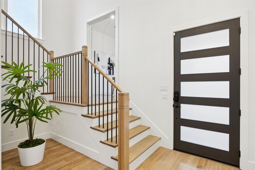 6281 Edgestone Drive Frisco, TX 75034 - Photo 3 of 40 Two story entry with modern front door.