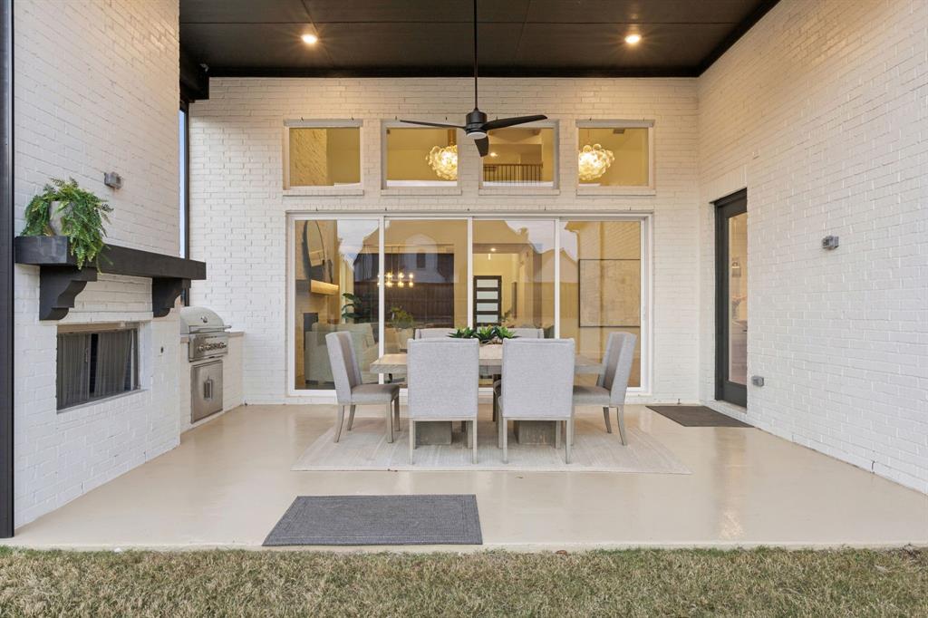 6281 Edgestone Drive Frisco, TX 75034 - Photo 33 of 40 Covered patio with high ceiling and remote sun shades.