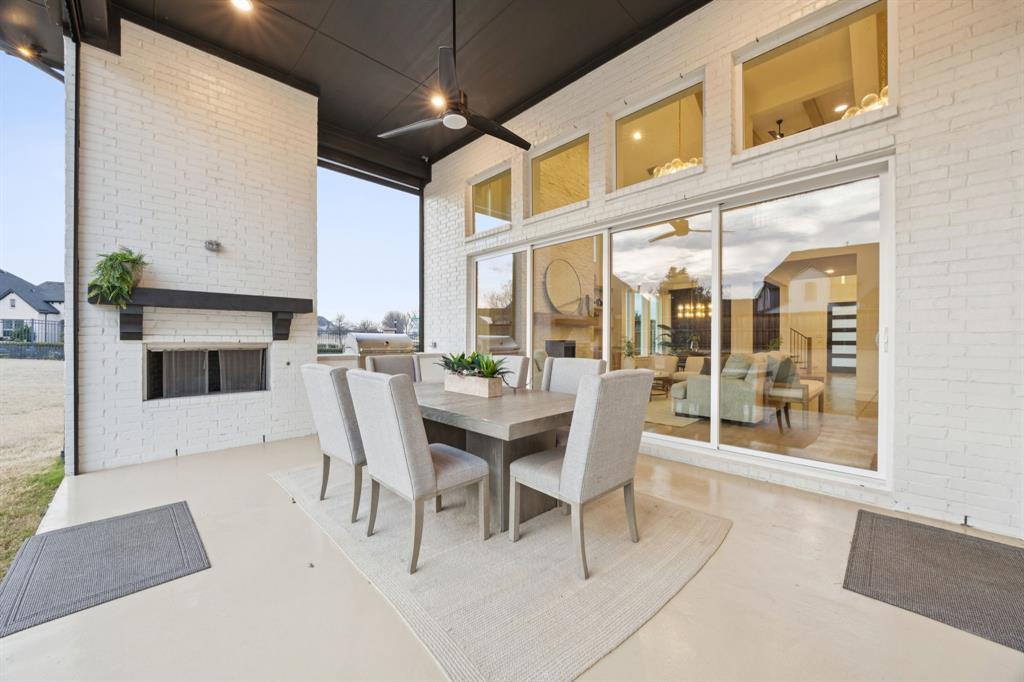 6281 Edgestone Drive Frisco, TX 75034 - Photo 34 of 40 Enjoy fireplace and built-in grill on patio.