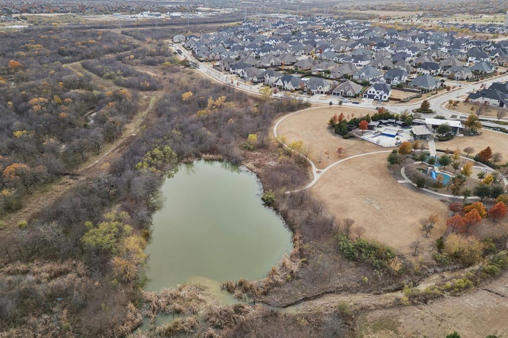 6281 Edgestone Drive Frisco, TX 75034 - Photo 40 of 40 Walk across the street to the park. Walk across the street to enjoy walking trails leading to a pond.