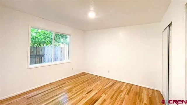 a view of a room that has a window in it