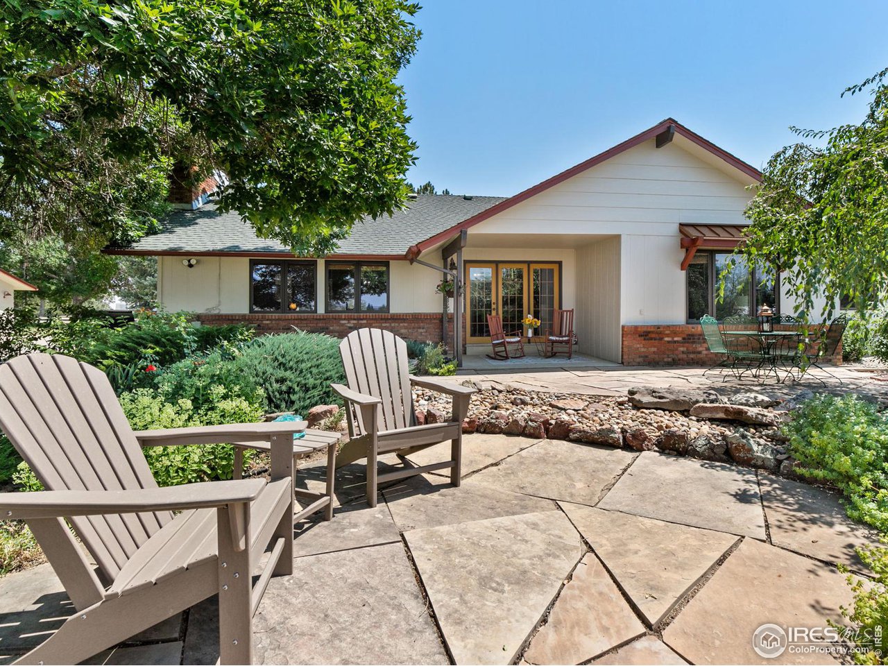 13581 Elmore Road Longmont, CO 80504 - Photo 28 of 34 Additional patio space by the water feature