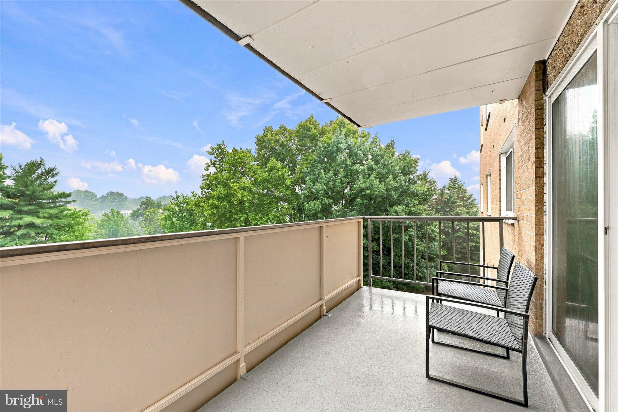 801 South Chester Road, Unit 306 Swarthmore, PA 19081 - Photo 2 of 15 Serene balcony with lush views.