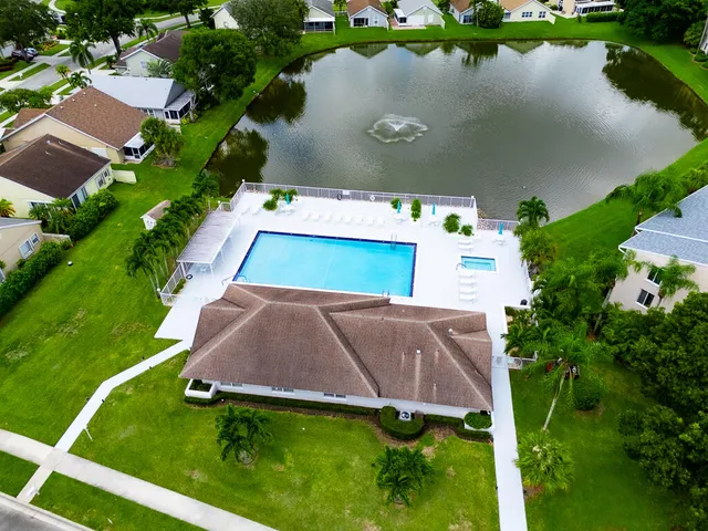 an aerial view of a house having yard
