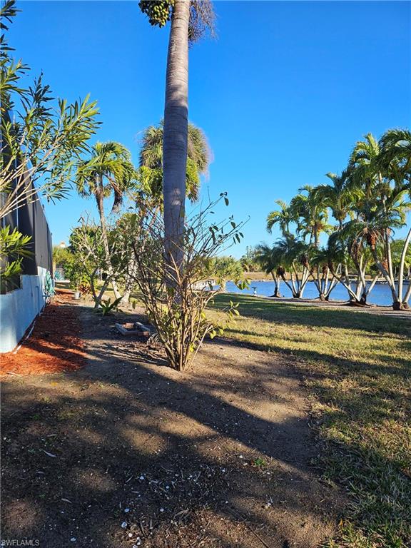 7791 Grande Pine Road Bokeelia, FL 33922 - Photo 16 of 45 a view of a yard