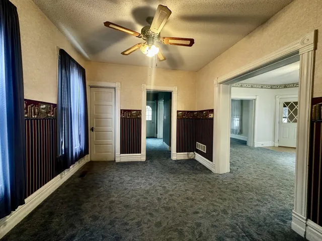 a view of a livingroom with a flat screen tv