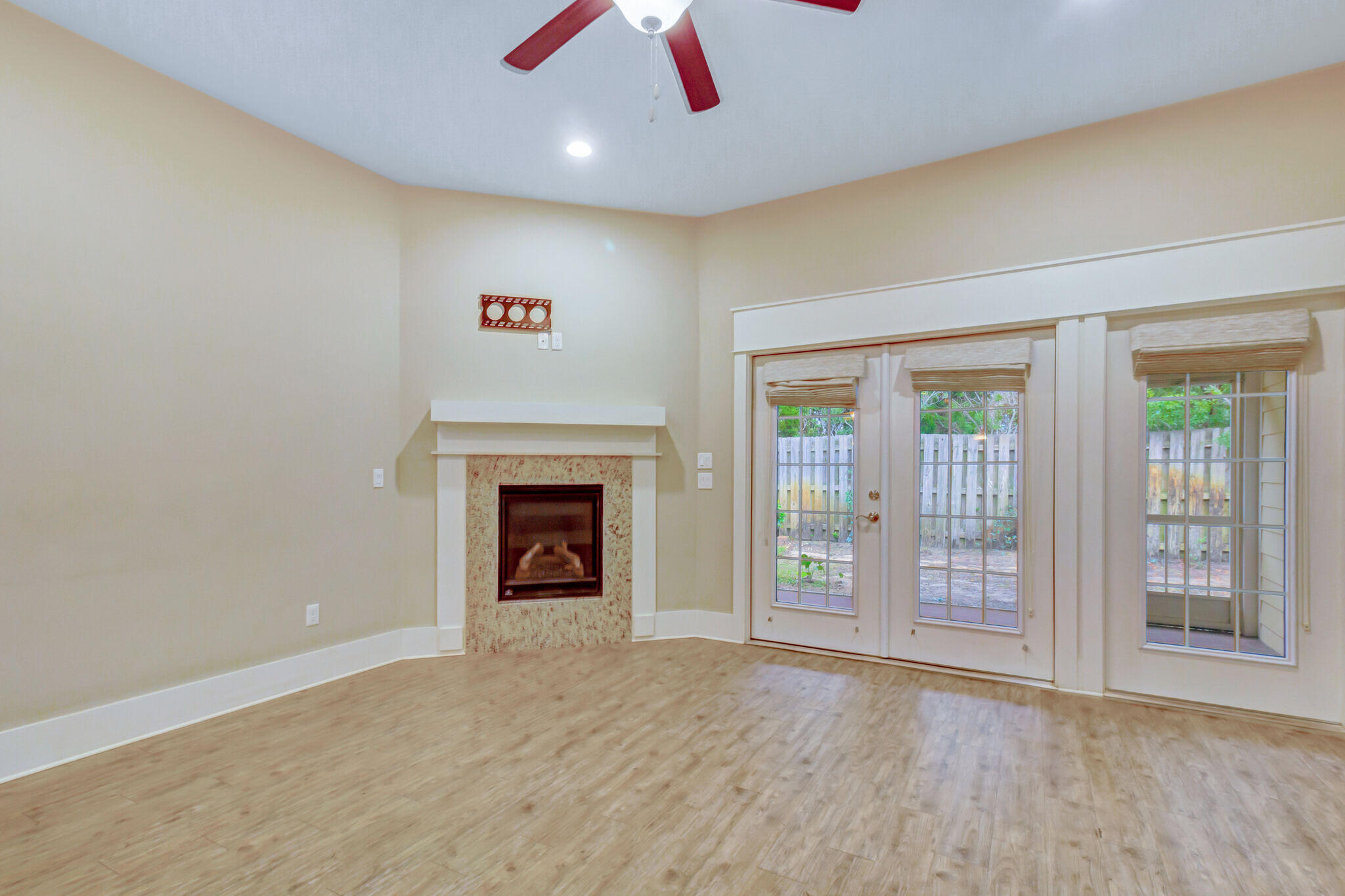 4232 Jade Loop Destin, FL 32541 - Photo 12 of 34 a view of an empty room with glass door