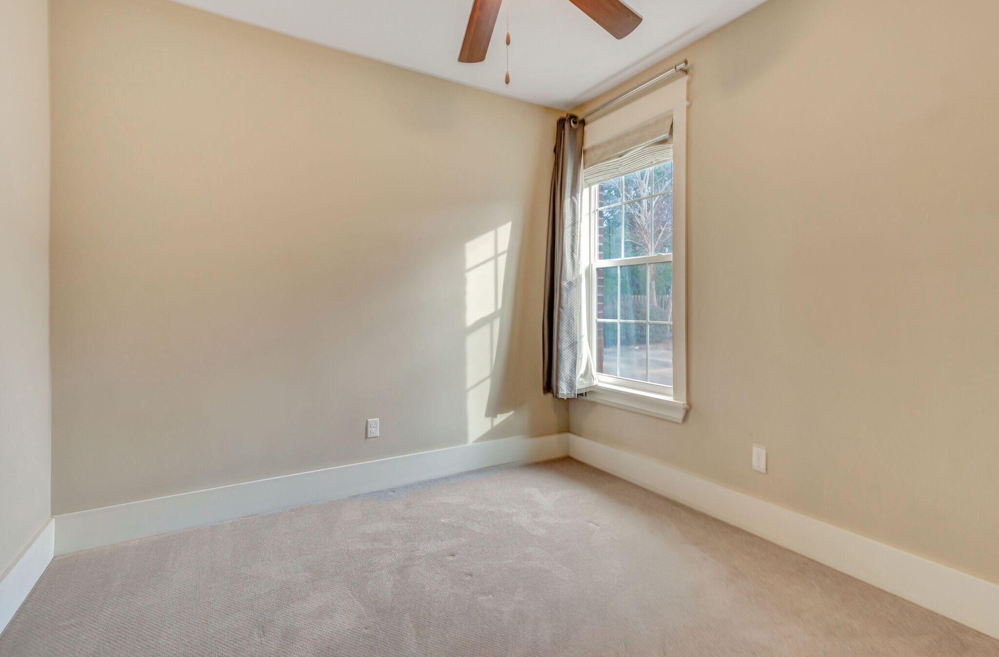 4232 Jade Loop Destin, FL 32541 - Photo 21 of 34 a view of an empty room with a window