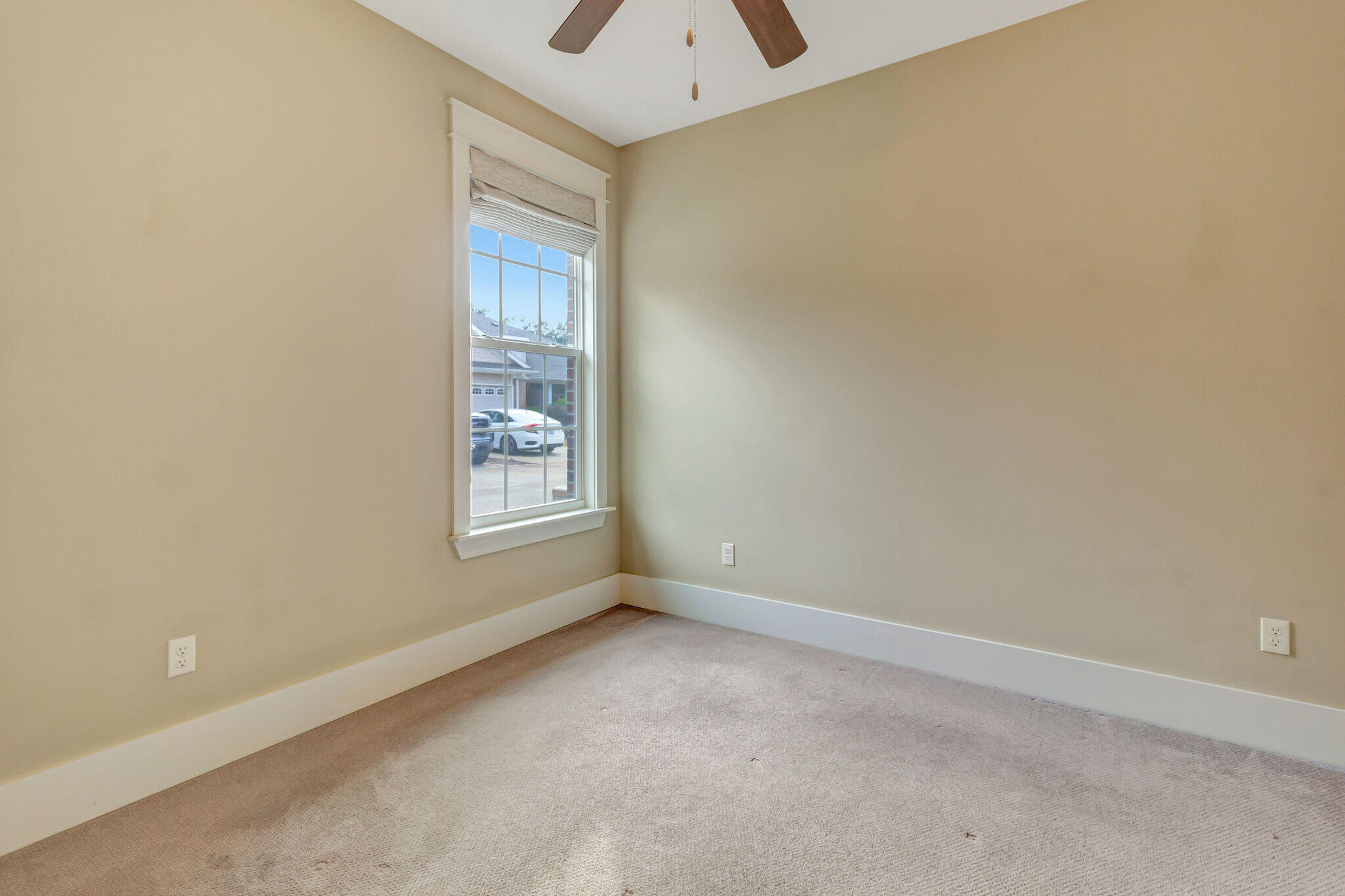 4232 Jade Loop Destin, FL 32541 - Photo 25 of 34 a view of an empty room with a window