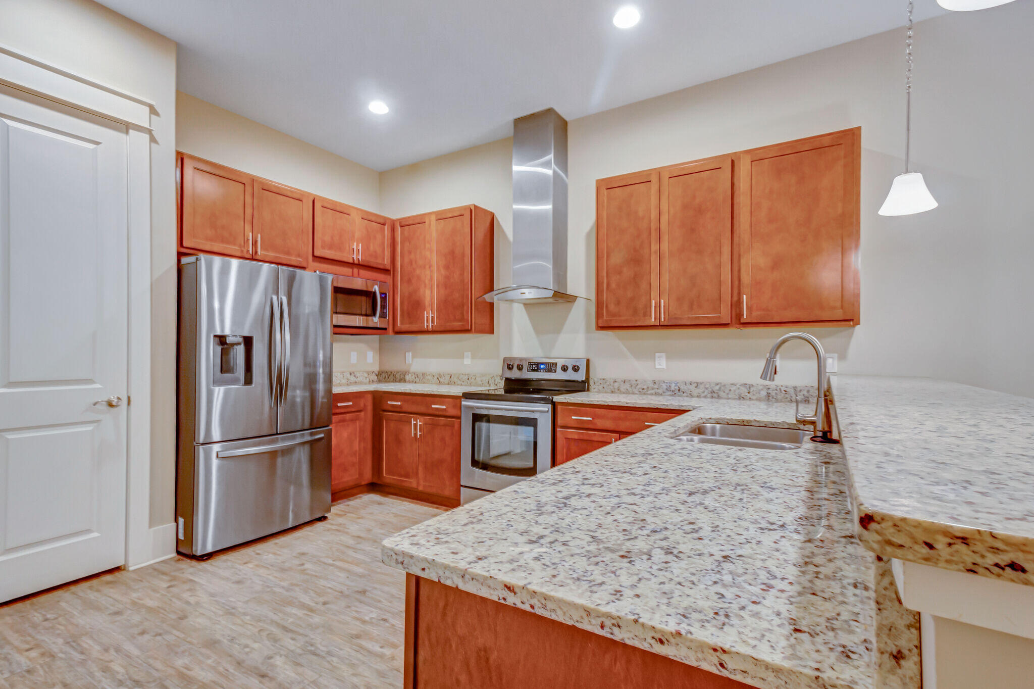4232 Jade Loop Destin, FL 32541 - Photo 6 of 34 a kitchen with stainless steel appliances granite countertop a refrigerator sink and stove