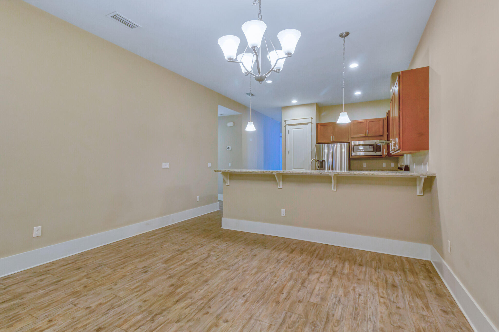 4232 Jade Loop Destin, FL 32541 - Photo 10 of 34 a view of kitchen and kitchen with stainless steel appliances